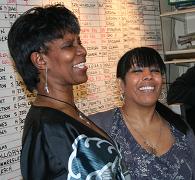 Carmen enjoys a laugh with one of her colleagues 